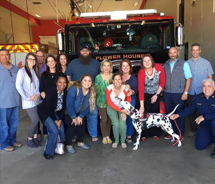 Leadership Flower Mound Class standing in front of the Flower Mound Fire Truck