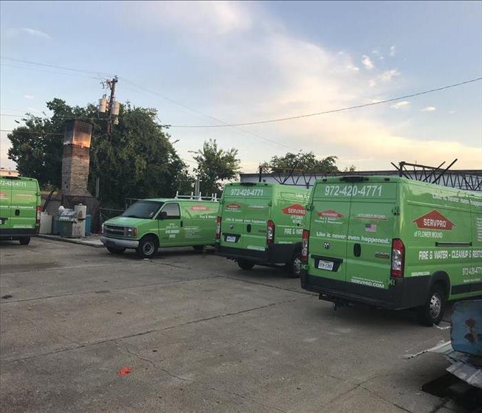 SERVPRO trucks and vans in the parking lot