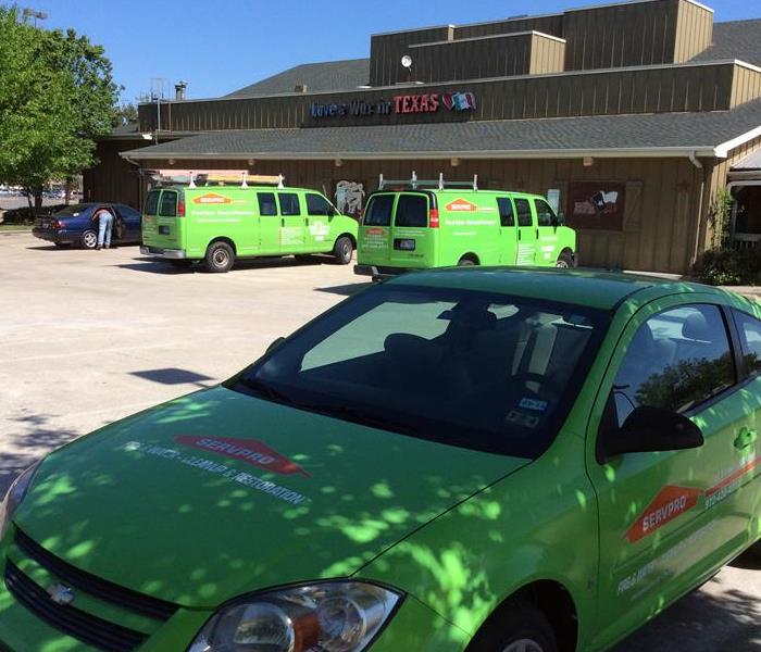 SERVPRO trucks parked in front of a restaurant